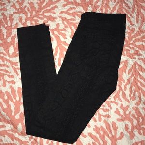 Snake print black jeans